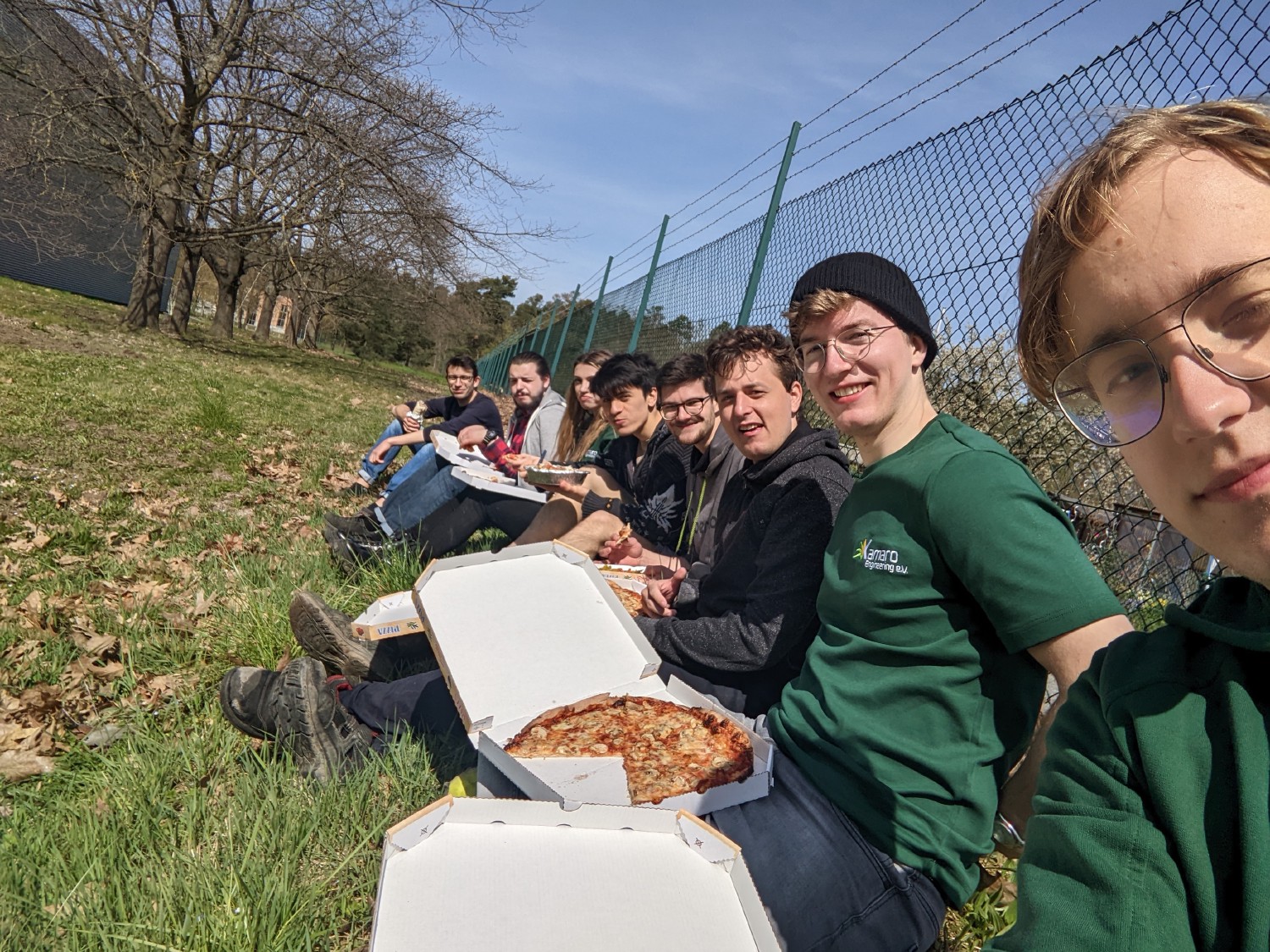 The team treats themselves to a small pizza break