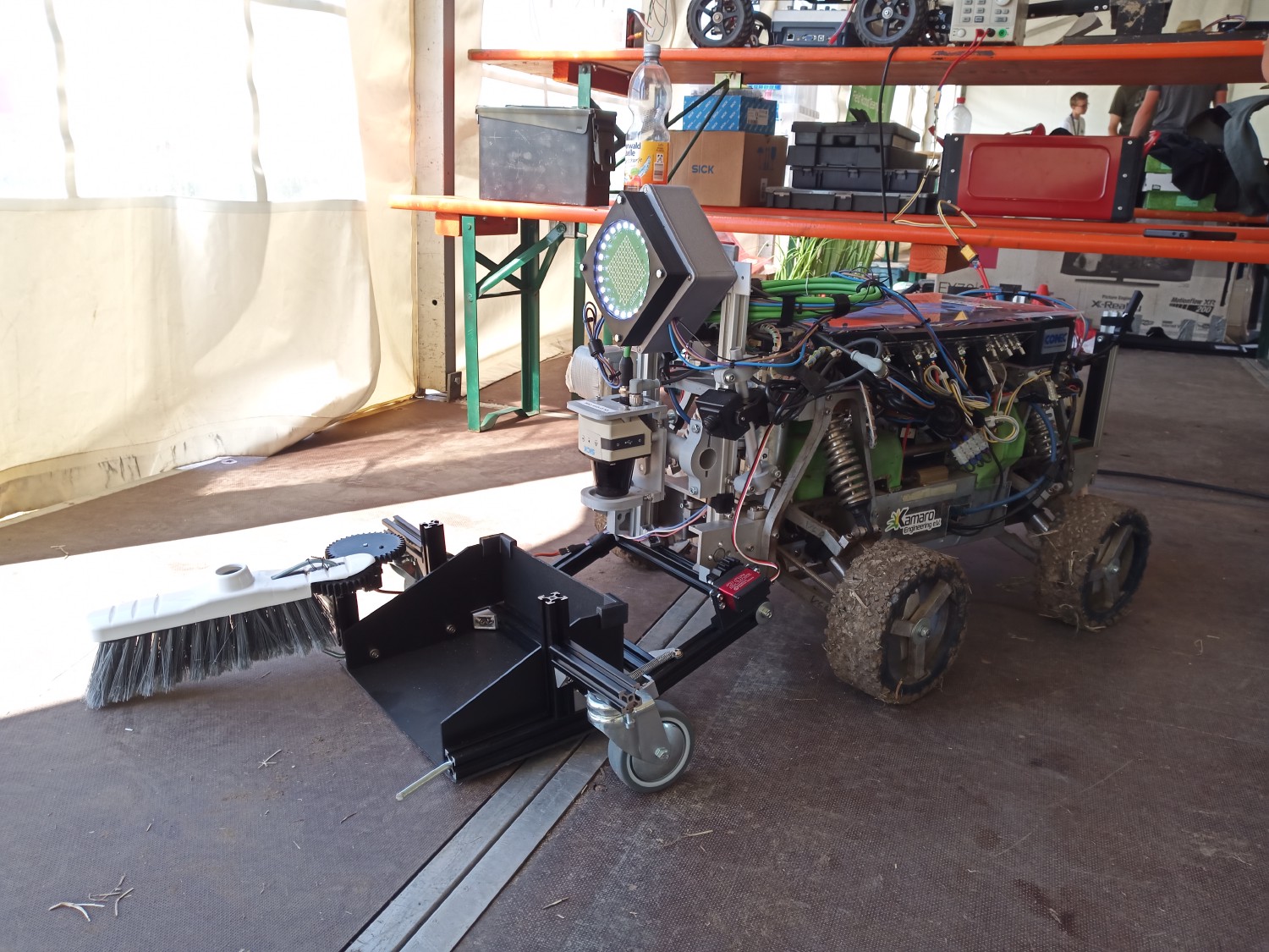 the robot betelgeuse with a shovel attached in the front